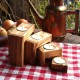 Set of 4 modern candle holders out of olive wood