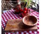 Set out of a cutting board and bowl fro breakfast