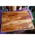 Large chopping board of olive wood with juice groove